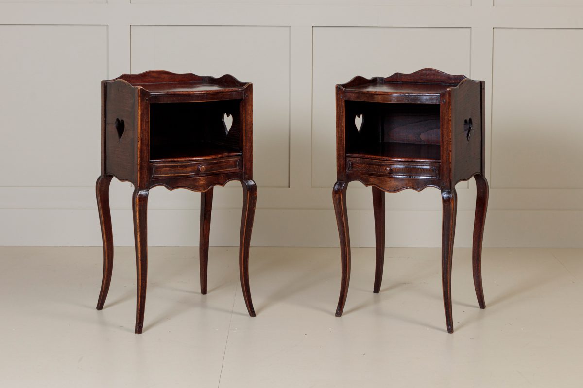 Pair French Serpentine bedside cabinets